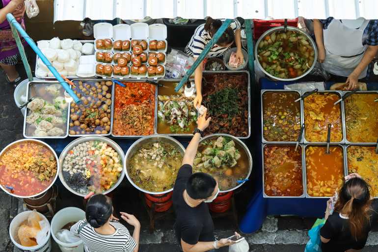 01 02 770 Bangkok Top view of a Thai street food shutterstock 770999983