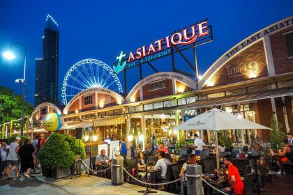 1400 BangkokEditorial Restaurant in Asiatique The riverfront in night time in Bangkok shutterstock 628258946